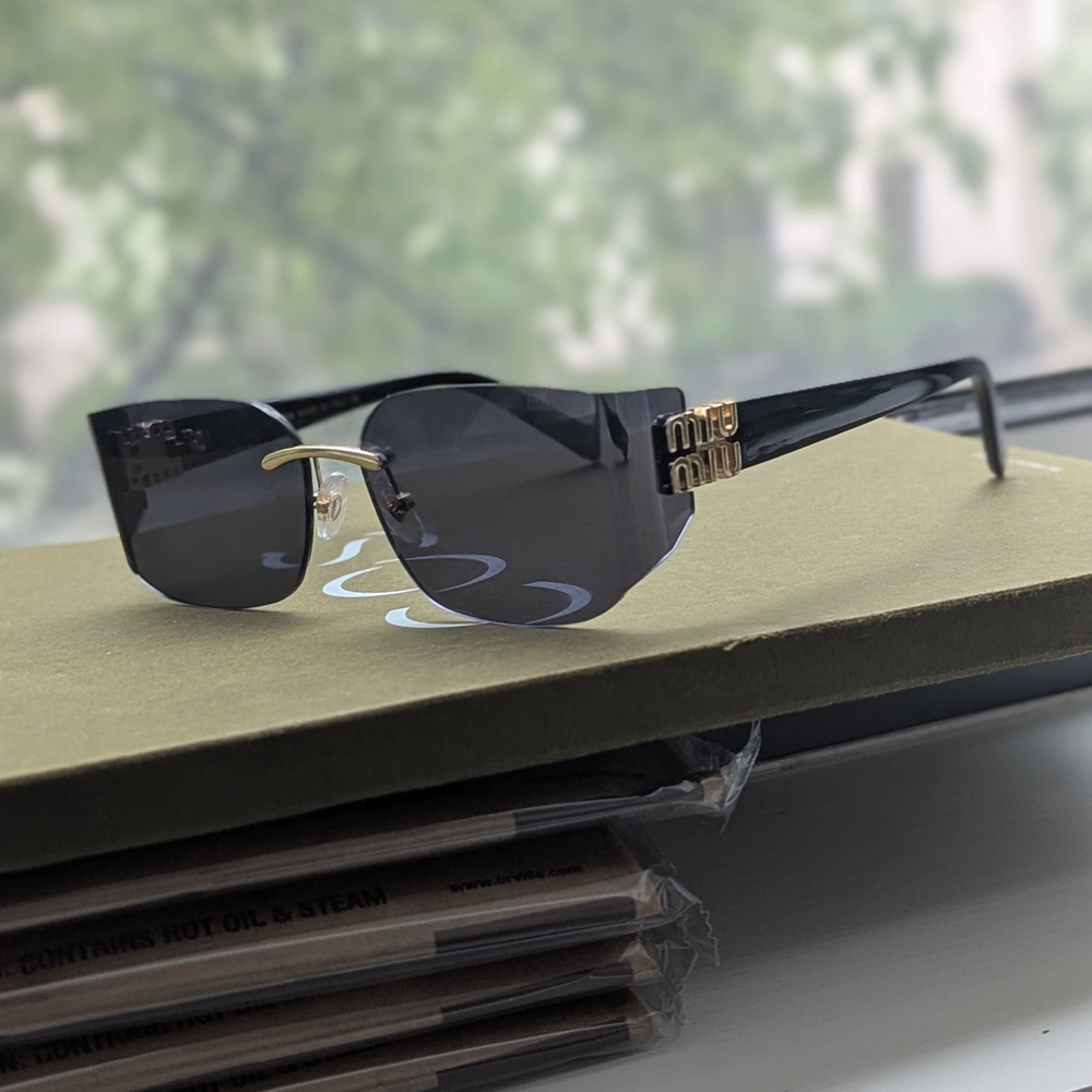 Miu Miu Black and Gold Rectangular Sunglasses